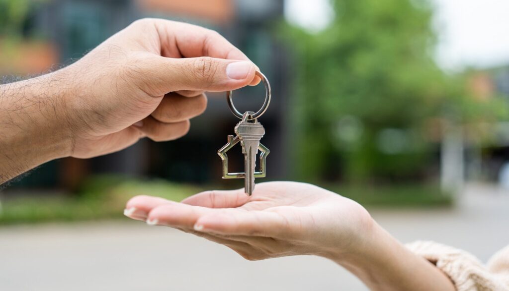 Woman buying or rent new home she holding